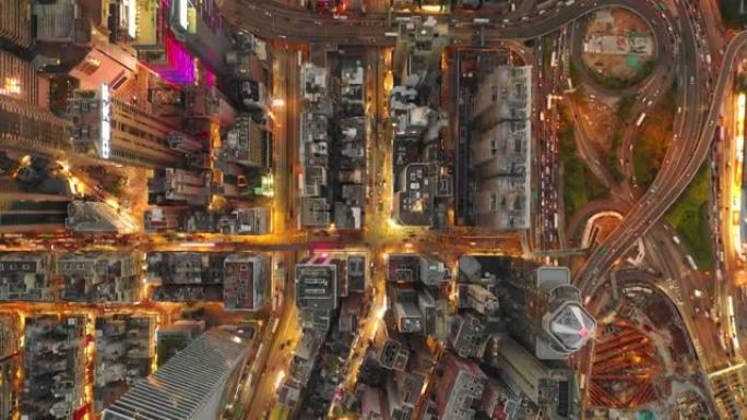 日落之夜照明香港城市交通街道湾仔区空中俯冲全景4k
