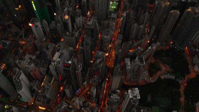 日落之夜照明香港城市交通街道空中俯冲全景4k