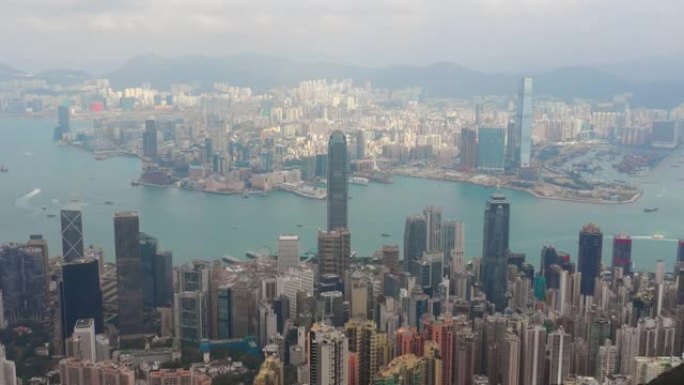 晴天飞越香港城市景观维多利亚港市中心交通空中全景4k