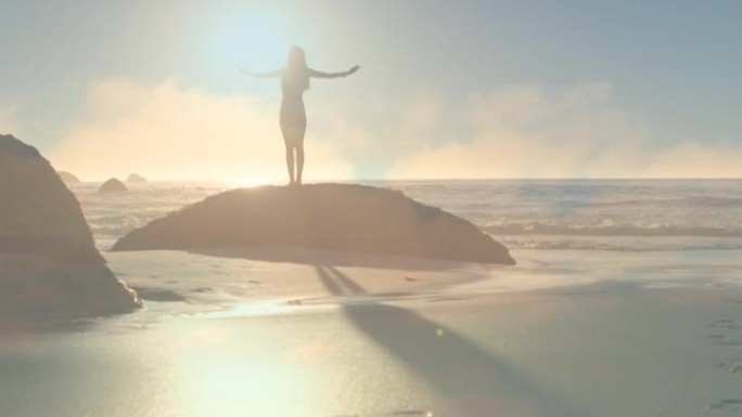 女人站在海边的岩石上发光的动画