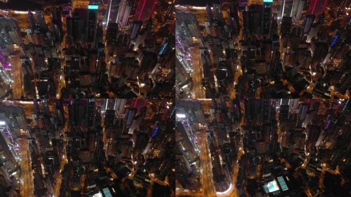 夜间照明香港城市景观市中心交通街道空中俯冲全景4k