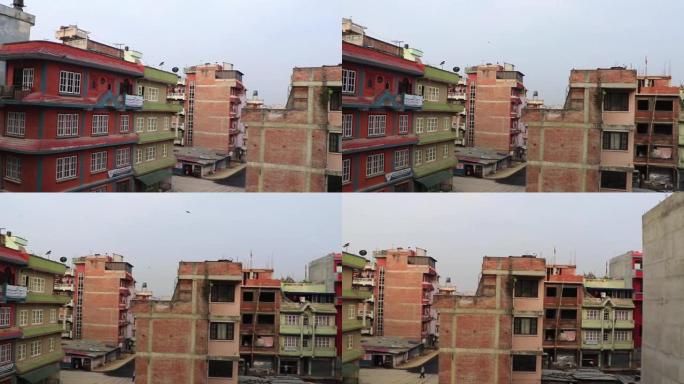 尼泊尔加德满都的多彩肮脏尘土飞扬的街道建筑区。
