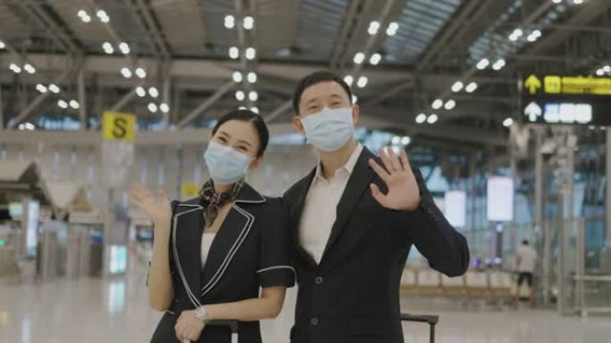 活跃的两名泰国客舱乘务员挥手欢迎乘客接种疫苗后前来-库存视频