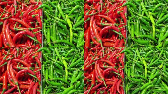 绿色和红色辣椒半堆对比颜色