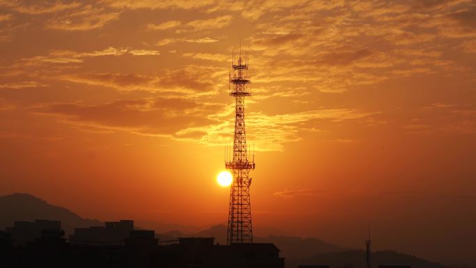 日出延时太阳从铁塔升起信号塔唯美早霞风景