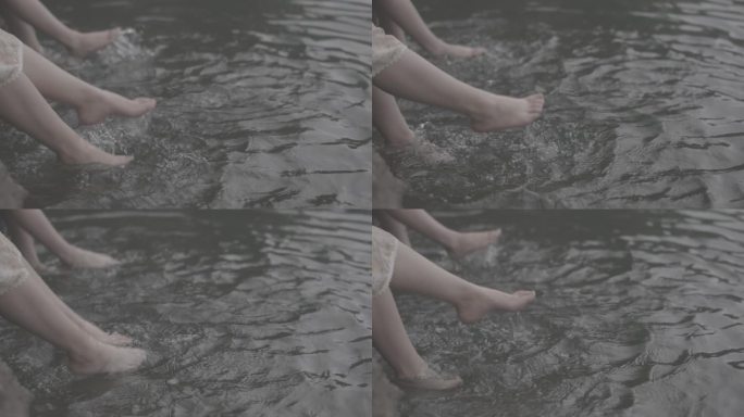少女水边洗脚