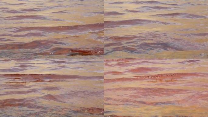 红色酸性矿山排水4k镜头的波浪水