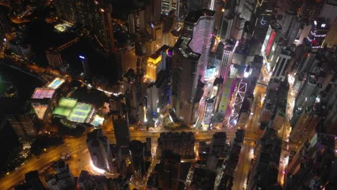 夜间照明香港城市景观市中心交通街道体育场空中俯冲全景4k