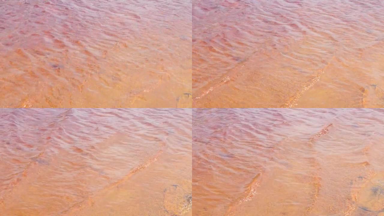 黄铁矿4k视频层上方的红色波浪状水