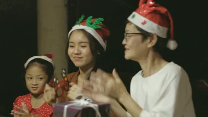 圣诞快乐在家，温暖的家庭在圣诞派对上拍手-股票视频