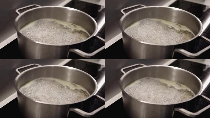 45度意大利面食在45度钢锅中烹饪的一般视图