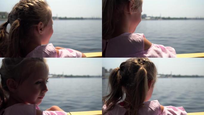 在perrilla渡轮上的女孩望着广阔的河流。在4k河上乘船旅行