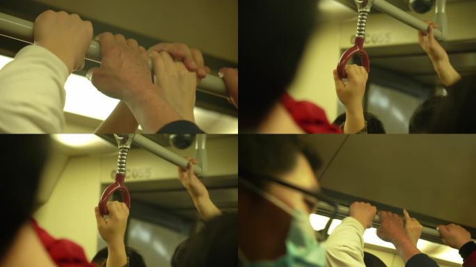 4K广州地铁三号线拥挤的人在抓住扶手