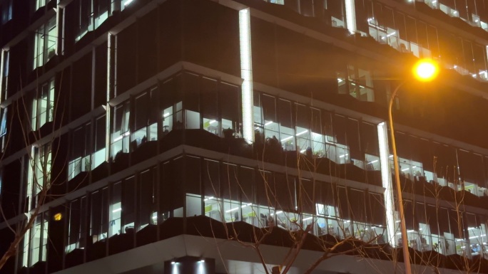 夜灯灯光加班亮灯 窗外夜景深夜窗户大楼