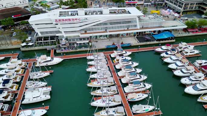 航拍海南三亚游艇旅游中心与帆船港帆船