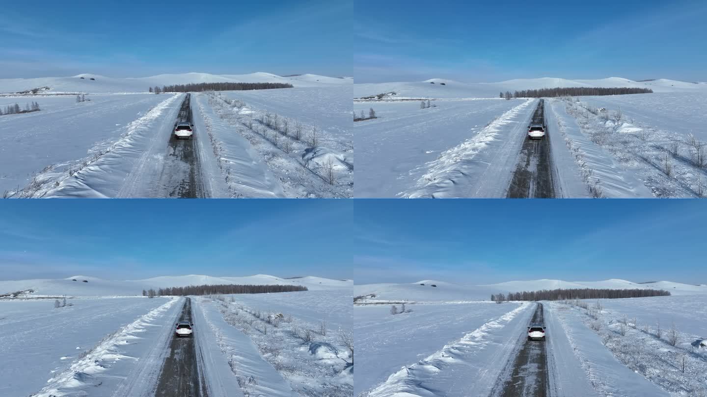 冰天雪地道路上行驶的越野车