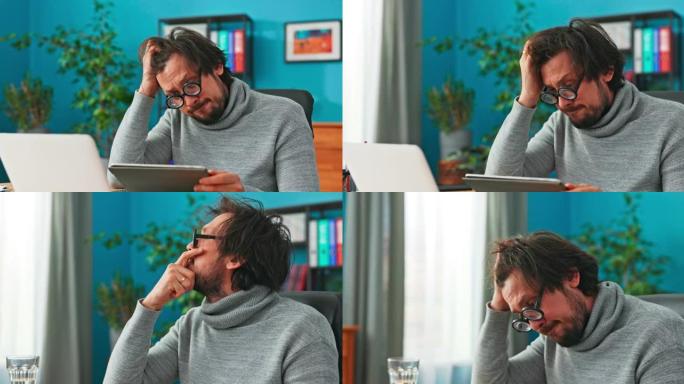 困惑的家伙，公司的新员工，正坐在办公室里戴着有趣的眼镜，手里拿着平板电脑，挠头，想着自己的登录，试图