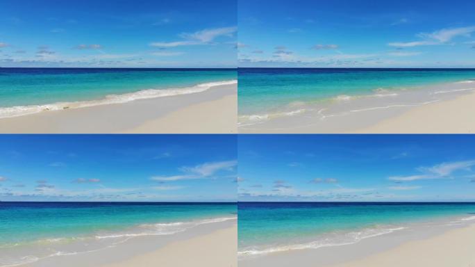 碧蓝的大海，晴朗的天空，美丽的白色沙滩。