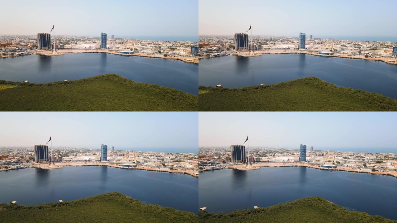 Ras al Khaimah corniche和阿联酋航空城市景观地标天际线在阿拉伯联合酋长国的海滨