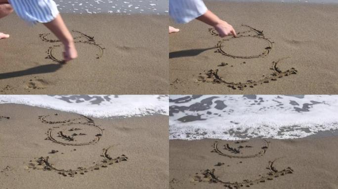 女人在潮湿的沙滩上画着笑脸，海波在沙滩上划过文字。