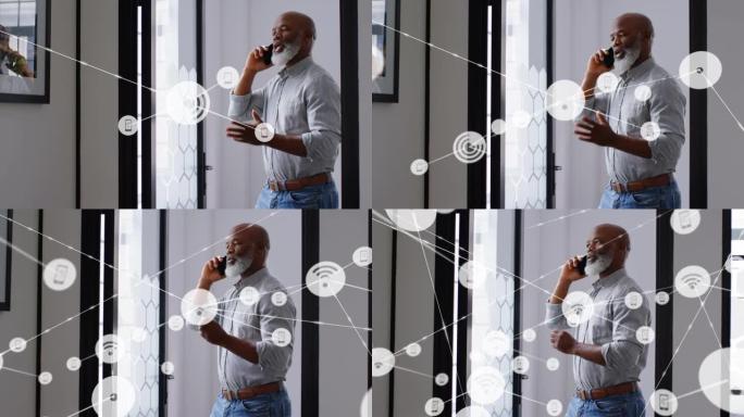反对非裔美国高级商人在办公室用智能手机聊天的数字图标网络
