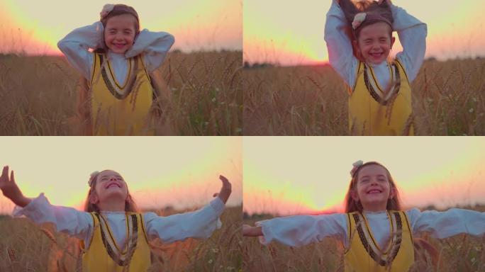 穿着民俗保加利亚服装的自由小女孩在日落时享受麦田的收获时间
