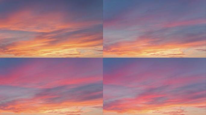 日落时美丽的云带光线自然背景延时镜头，红色橙色蓝色日落天空云4k镜头。