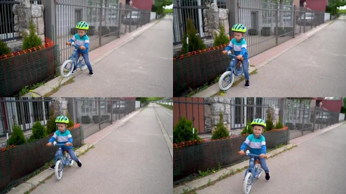 开朗的小男孩骑着自行车大喊