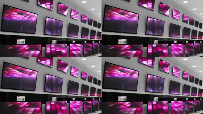 电子商店的内部，在多台电视的屏幕上播放同步视频
