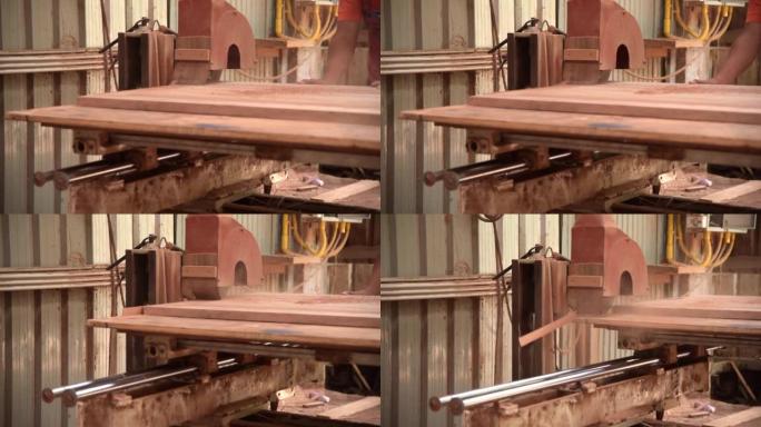 木工车间生产板材的工作