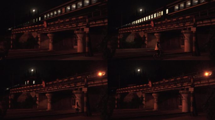 夜晚的桥上火车驶过视频素材