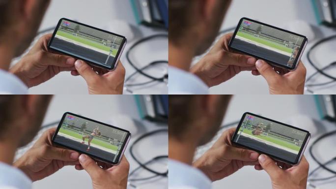 男医生在智能手机上观看田径跳高比赛的综合
