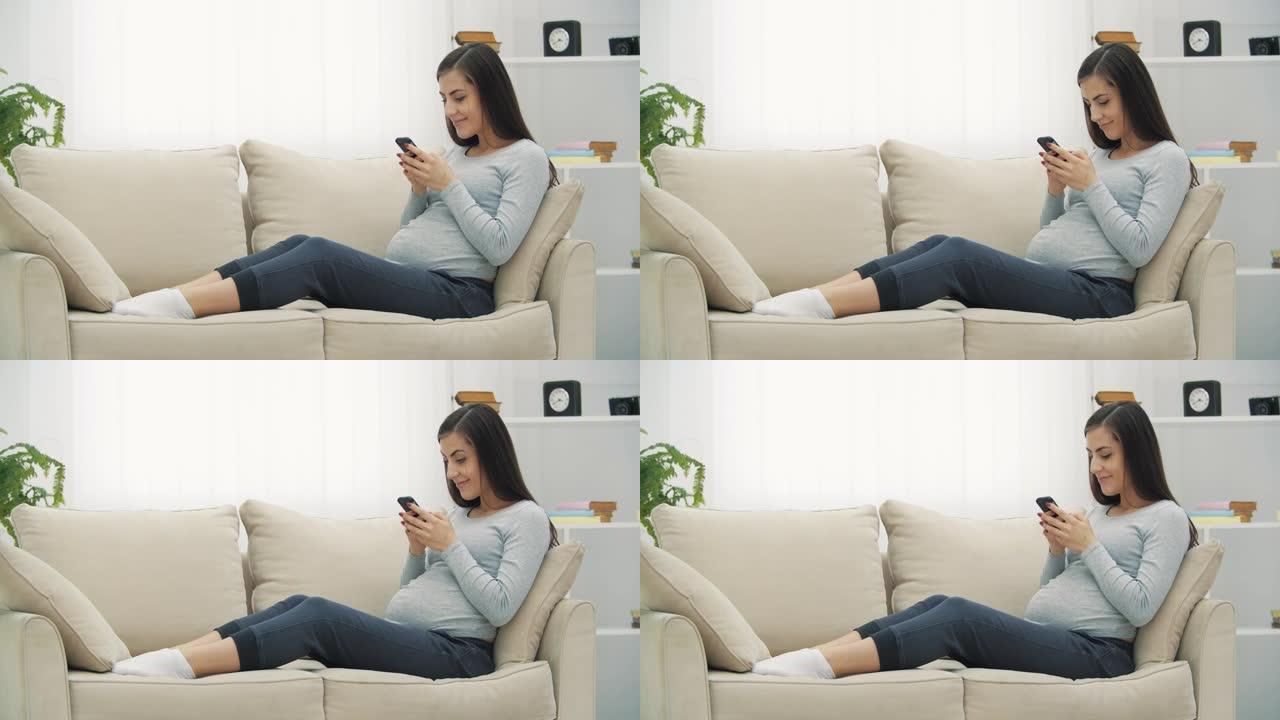 孕妇使用手机的4k视频。