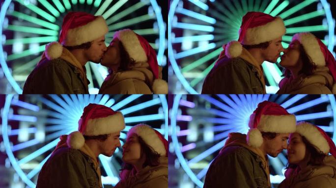 爱情情侣在城市街道上接吻。深情的一对在户外感觉快乐。