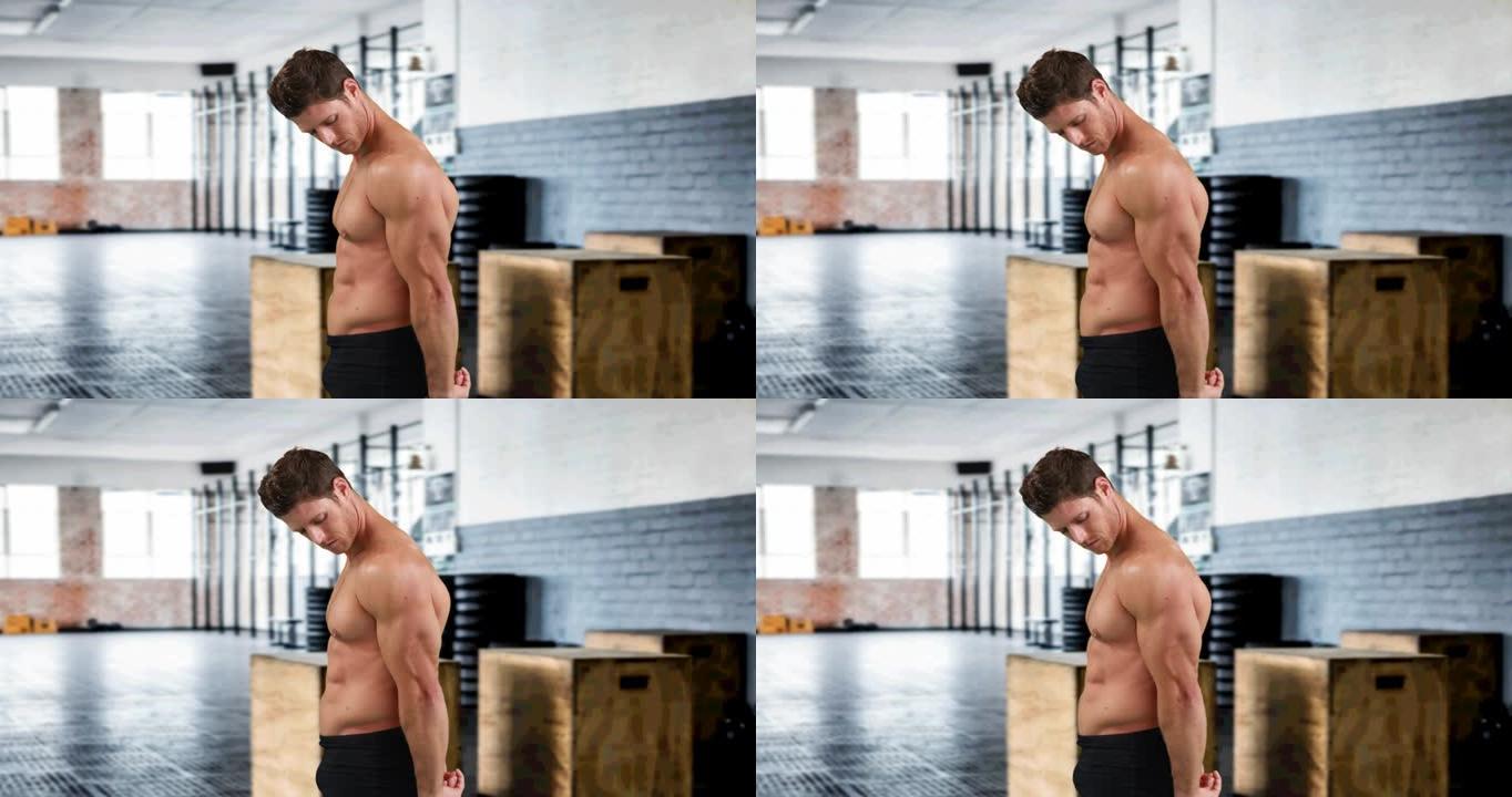 强壮的肌肉男子在健身房上弯曲肌肉的动画