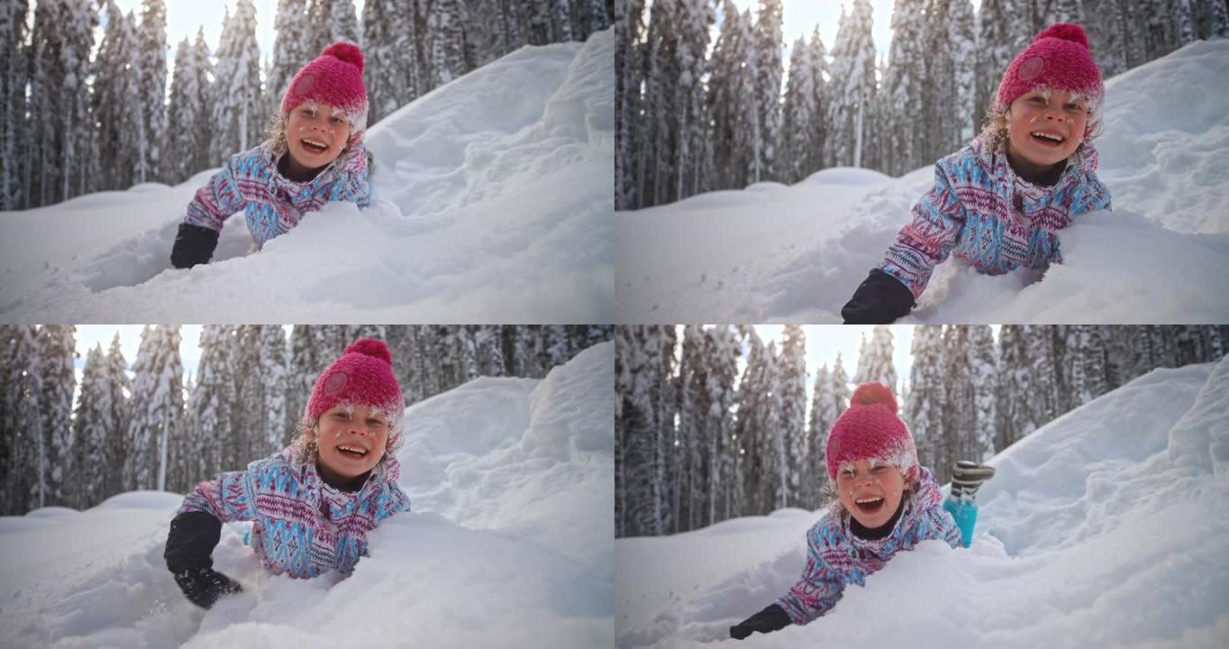 SLO MO女孩躺在雪地里，一边笑，一边向镜头扔雪