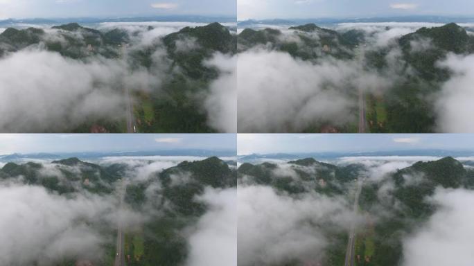 在雾的热带山脉上空飞行，空中视频