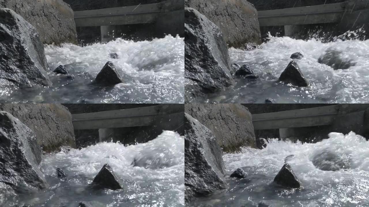 河水在河中流动和飞溅的镜头