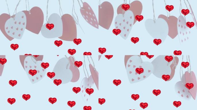 多个红色心形气球漂浮在悬挂的心形装饰品上
