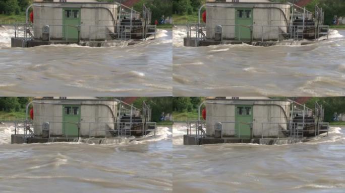 洪水、洪水附近的河流、水电、大坝墙、电站/视频