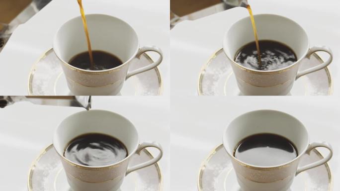 Moka pot将咖啡倒入杯子中