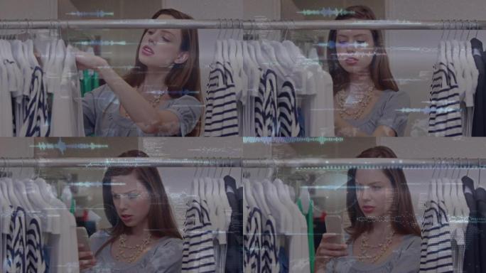 女人在看商店里挂着的衣服时使用智能手机对女人进行数据处理的动画