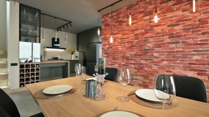 现代豪华深灰色和带餐桌的厨房