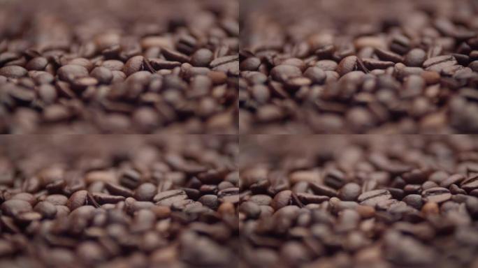 棕色咖啡豆，微距摄影。烤咖啡豆特写。生产具有咖啡因含量的热饮产品的概念