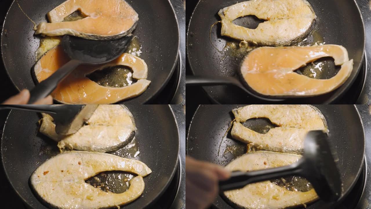 黄油炸三文鱼在黑锅上翻动。顶视图。低卡路里的健康菜单。