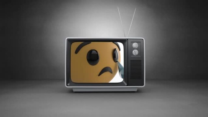 电视屏幕上灰色背景下哭泣表情符号的数字动画