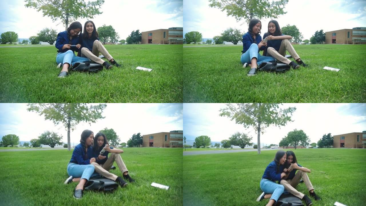 高中校园教育中的西班牙裔女性青春期前学生在草坪前行走与技术互动智能手机教育设施面具要求实时4K视频系