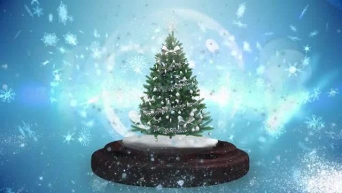 雪球中的圣诞树动画，雪花飘落，蓝色发光
