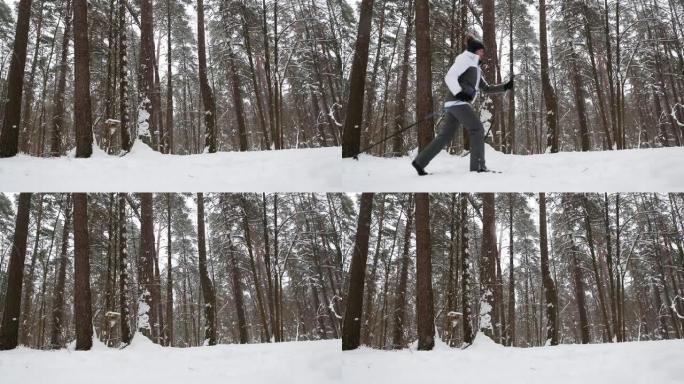 冬季降雪中，一名女子在越野滑雪道上穿过白雪皑皑的森林。冬季运动、保暖服装、滑雪服、防风防水膜
