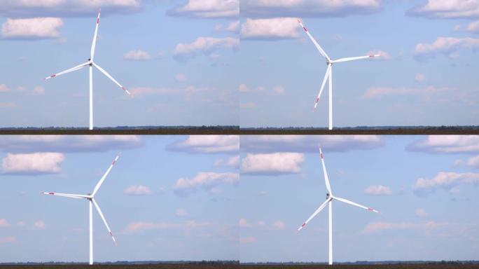 在阳光明媚的夏日，旋转风力涡轮机在野外一定距离的天空